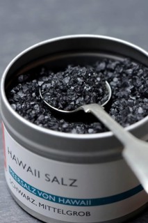 Black Hawaiian salt with spoon in tin