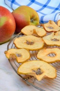 Dried apple slices and apples