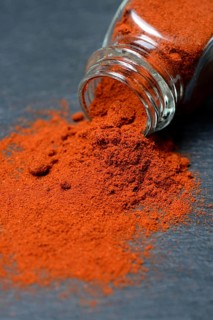 Paprika powder in glass bottle