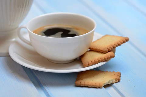 Butter biscuits and cup of coffee