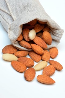 Sweet almonds in linen bags