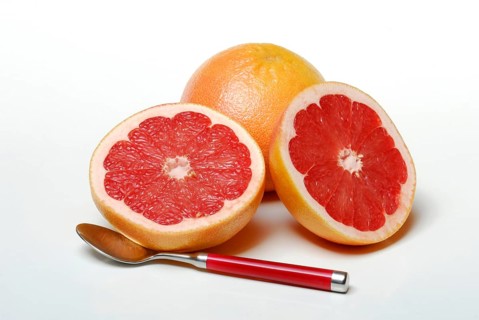 Grapefruit and spoon