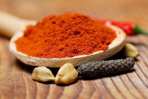 Powder in a wooden spoon