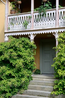 Climbing hoards in front of a wooden veranda
