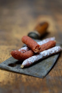 Different kinds of sausages on a chopper
