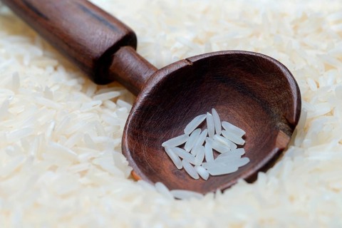 Basmati rice in wooden spoon