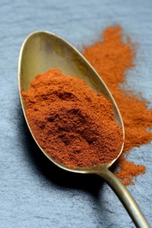 Paprika powder in spoon