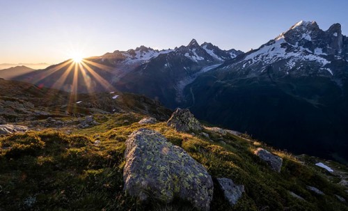 Sun shines over mountains