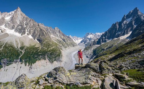 Climber standing on rocks