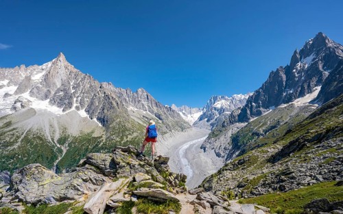 Climber standing on rocks