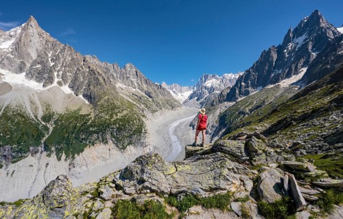 Climber standing on rocks