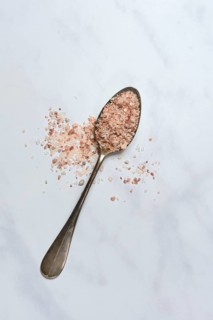 Natural salt on a spoon