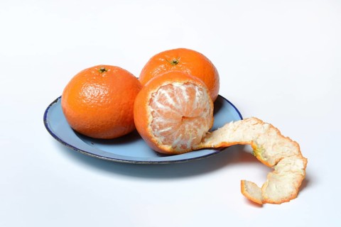 Clementines on plate