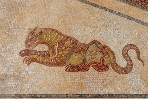 Mythical animals decorating walls in Estoi Palace garden