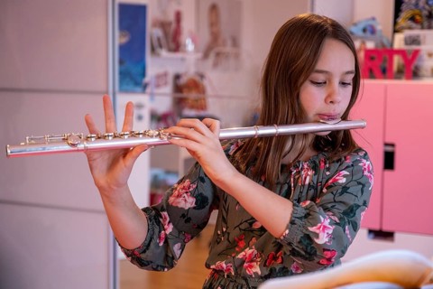 Girl playing flute