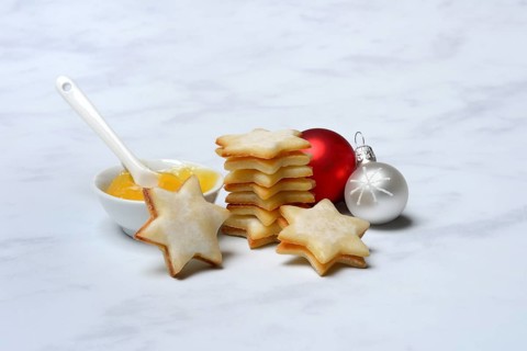 Lemon cookies and bowl with lemon curd