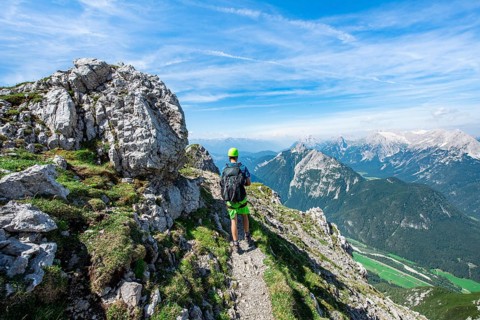 Mountaineers hiking on the Mittenwalder Hoehenweg via ferrata