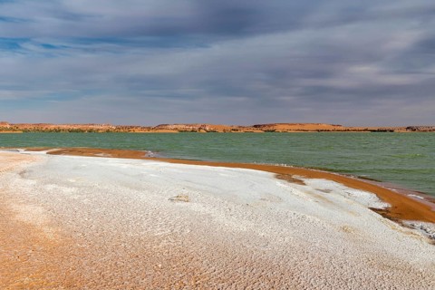 Salt crust at the shores of Ounianga kebir part of the the Unesco sight Ounianga lakes