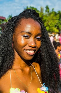 Girl posing at the Carneval in the town of Sao Tome