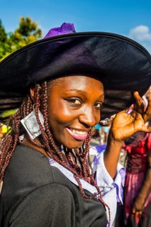 Girl posing at the Carneval in the town of Sao Tome