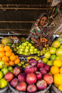 S ales woman on her fruit stall
