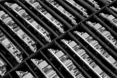 Engine parts packed in a transport pallet