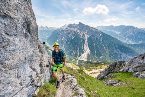 Mountaineer on a secured via ferrata