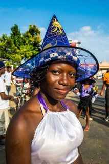 Girl posing at the Carneval in the town of Sao Tome