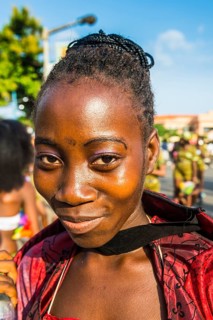 Girl posing at the Carneval in the town of Sao Tome