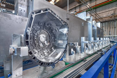 Engine part on the assembly line of the car parts factory
