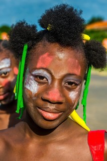 Girl posing at the Carneval in the town of Sao Tome