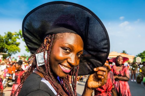 Girl posing at the Carneval in the town of Sao Tome
