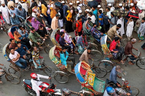 Completely with rickshaws overcrowded street in the center of Dhaka