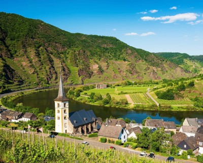 Winegrowing village Bremm at the Moselle with St. Laurentius church
