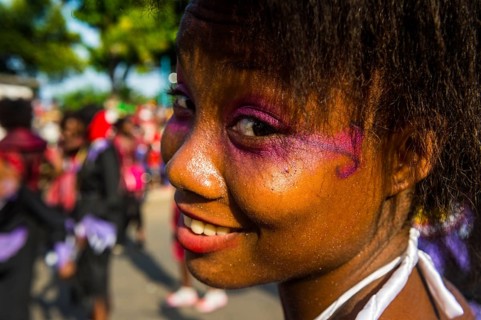 Girl posing at the Carneval in the town of Sao Tome
