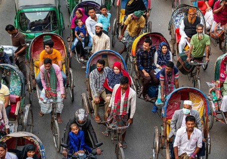 Completely with rickshaws overcrowded street in the center of Dhaka