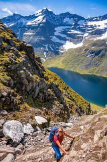Hiking on a steep trail to Innerdalstarnet
