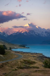 View of Mount Cook with road and lake