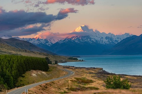View of Mount Cook with road and lake