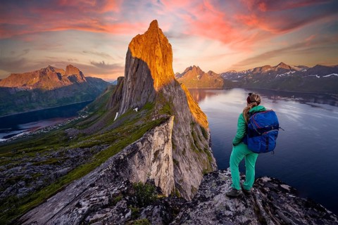 Hiker looks at landscape