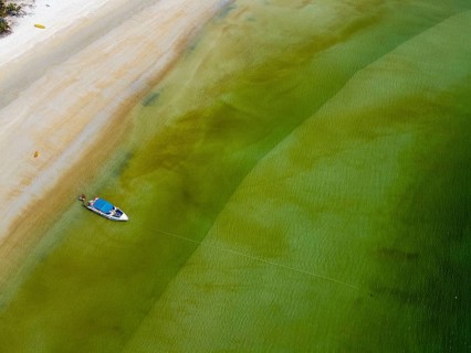 Aerial of a White sand beach on Thel Ni Aw island
