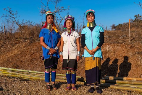 Laughing three Padaung women