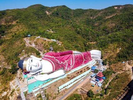 Aerial of a giant reclining buddha in Win Sein Taw Ya outside Mawlamyine