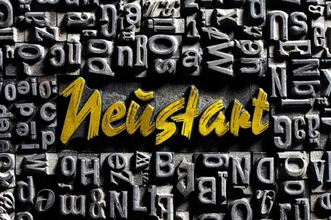 Old lead letters with golden writing