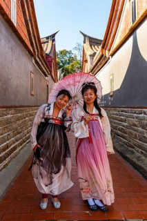Local dressed women in the traditional Minnan-style houses