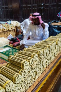 Man selling chewing sticks