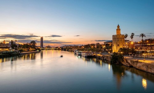View over the river Rio Guadalquivir with Torre del Oro