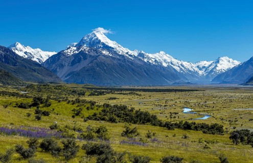 View of Mount Cook and snow covered mountains with Tasman River