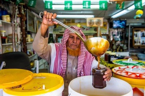 Men selling honey