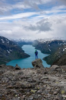 Hiker stands on rocks
